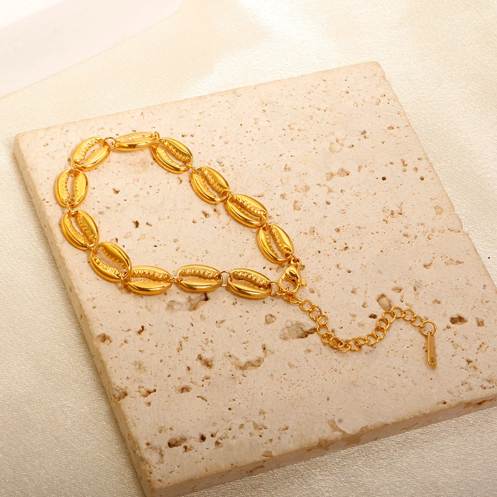 Pulseira Conchiglia Aura Dourada